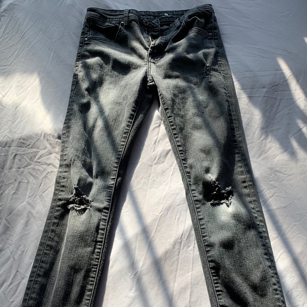 The Kingston ag skinny slightly ripped black jeans